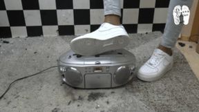 Radio crushed under Nike Sneakers