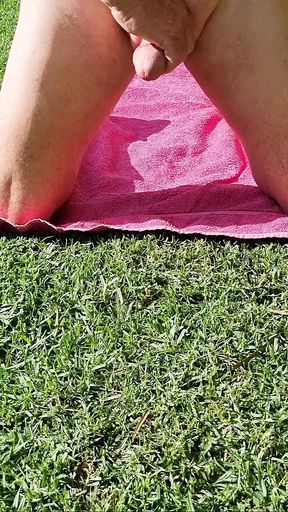 Masturbating in the sun in backyard