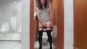 Horny tranny in the toilet wanking off in borrowed shoes