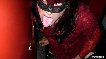 Sucking off 2 cocks at the gloryhole