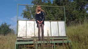 Crossdresser Playing Down On The Farm In Pvc