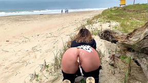 Anal creampie on a public beach