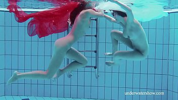 Two hotties naked in the pool