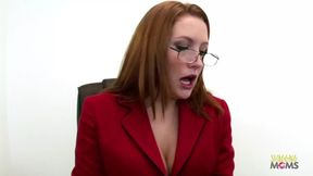 At work, a slender individual engages in sexual intercourse with a coworker who has a striking red hair.