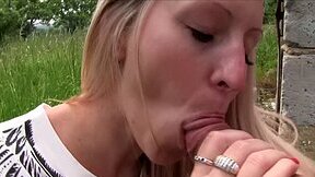 Blonde nympho sucks hard prick and gets fucked outdoors