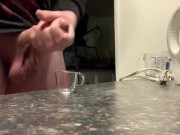 Cumming in a measuring glass