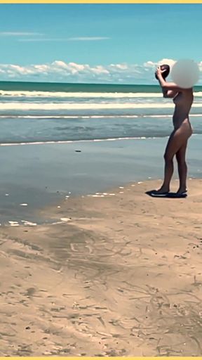 Jaw-dropping moment from &quot;Wifey strips nude and plays with the football at the beach&quot;