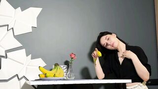 Teen girl using banana to cum