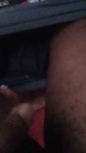 Masturbating
