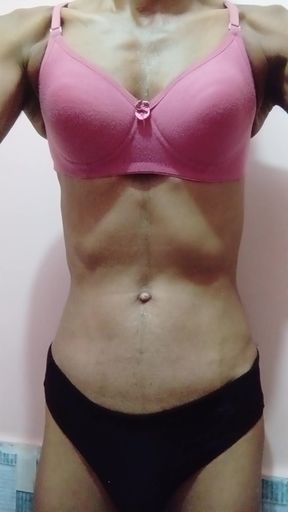 Sissy wearing pink bra and red panty