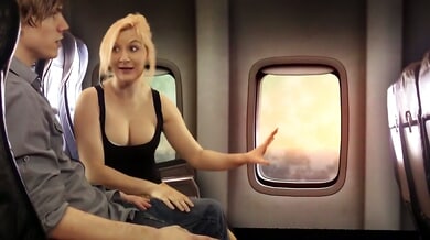 Blonde passenger gives a discreet handjob on a sunset flight