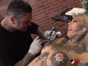 Amber Luke masturbates while getting tattooed