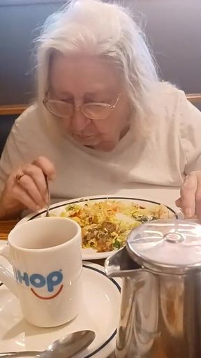 Stepmom and I eating breakfast