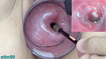 Kinky MILF plays with her cervix using an endoscope cam