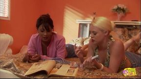 Brunette and blonde girlfriends start kissing on the bed and it leads to lesbian sex