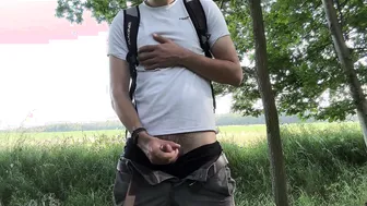 Horny German twink pisses and jerks his big uncut cock outdoors