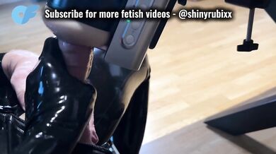 Femdom mistress in latex gloves fucks with automatic stroker
