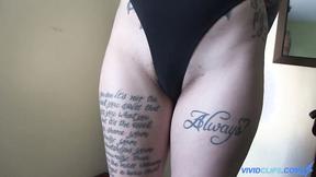 ”Two tatted lesbo girls enjoying strapon dildo”