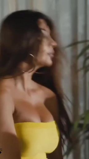 Latin beauty in a yellow dress