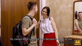 Stepmother's Friend Enjoys Intense Encounter in the Kitchen with a Young Stud