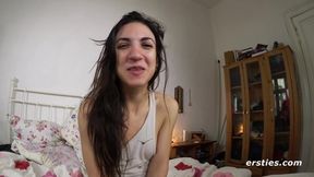 Horny Magena plays with her hairy pussy