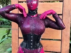 Outdoor solo masturbation scene with curly blonde