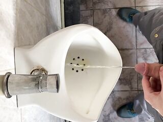 Peeing in a public toilet view from the eyes