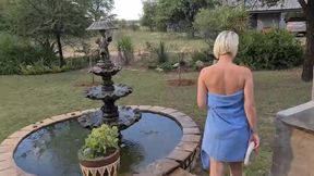 Being one with nature as I enjoy showering outdoors in the woods at a nude resort