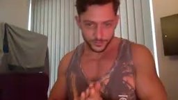 Dom Flexes His Arms and Arm-wrestles