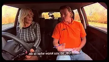 Seductive Blonde Cougar Takes Control in a Steamy Driving Lesson