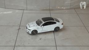 RC Car under naked feet and clear heels