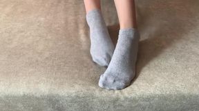 Hot blonde Rae Lil Black gets her legs and feet ready for a public fucking