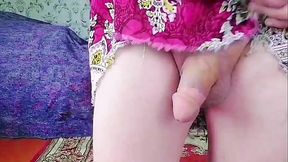 Adorable femboy having fun with fluffy accessories