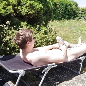 Young Nike Boy has fun outdoors and squirts