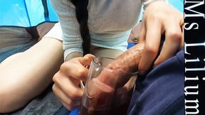 Asian babe works cock in public camping