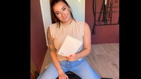 Isla Vayne facesitting in jeans and heels while reading a book