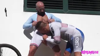 Gay bear in lycra cycle suit gets outdoor blowjob with feet and socks play
