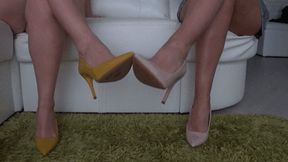 Flirting beautiful legs in colored high heels Ad