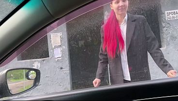 Cute student takes a ride in the backseat