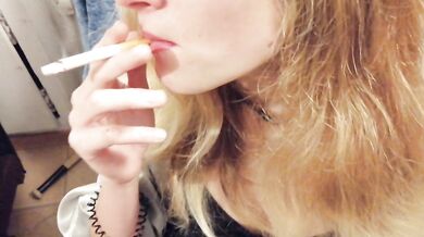 Smoking flashing teen blows smoke in his thick cock