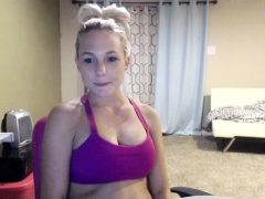 Sexy curly blonde teen does striptease and shows her boobs