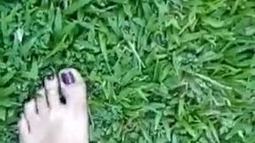 feet in the grass