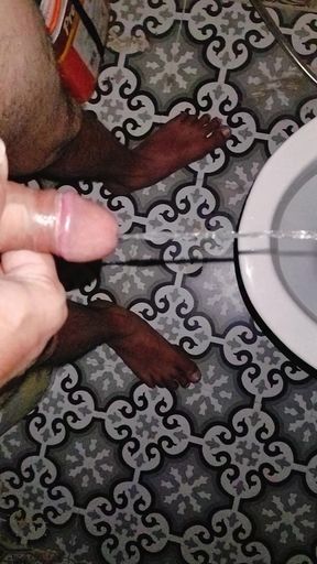 Peeing with big pink dick
