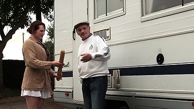 Serious redhead whore double penetrated in a gangbang with an old man