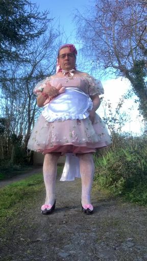 In a babydoll outfit to pee a second time in the diaper outside