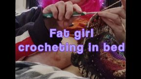 Fat girl crocheting in bed