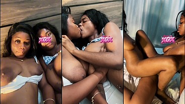 Pretty big tit African sisters Asari XOX and Skyla Koko lick each other's pussies