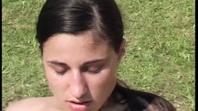 Sensual brunette gets screwed lying on the lawn