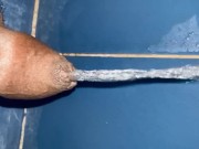 Good clear piss game on the bathroom floor
