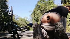 Young man playing with his bike with dildo in his ass